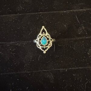 Elegant Silver Ring with Teal Gemstone